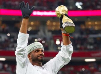 Oman legend Ali Al Habsi holds up the FIFA Arab Cup trophy prior to final match