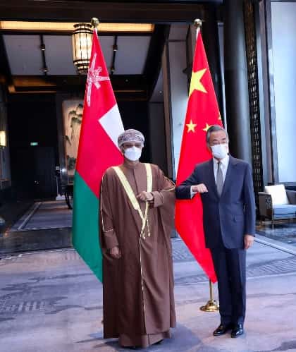 Omani Foreign Minister Sayyid Badr bin Hamoud bin Al-Busaidi and Chinese State Councilor and Foreign Minister Wang Yi
