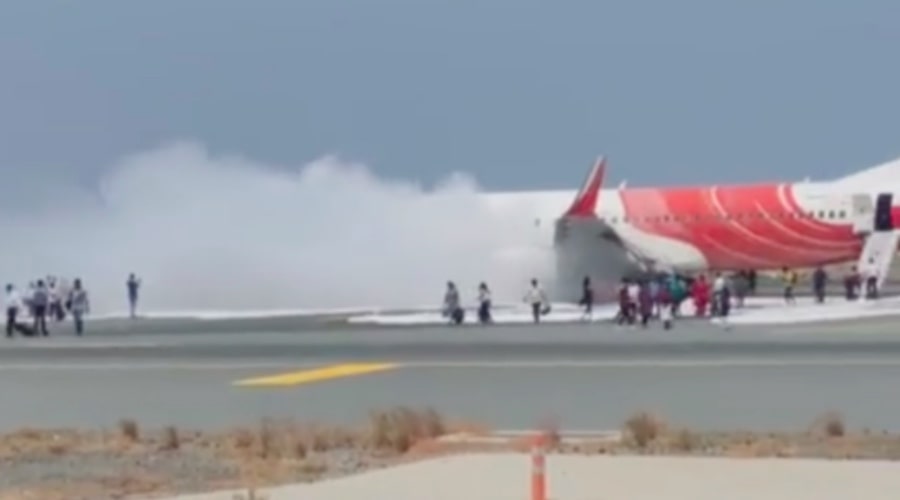air india flight catches fire at muscat